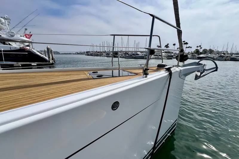 Slide: The Image of Sleek 2016 Hanse 455 yacht docked in a marina, showcasing elegant design and craftsmanship. - 20