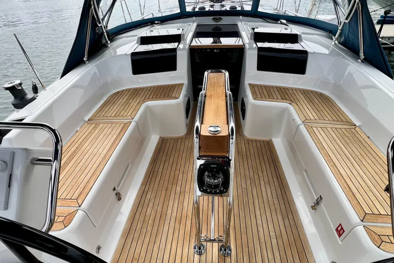 Slide: The Image of 2016 Hanse 455 yacht cockpit with teak flooring and sleek design. - 54