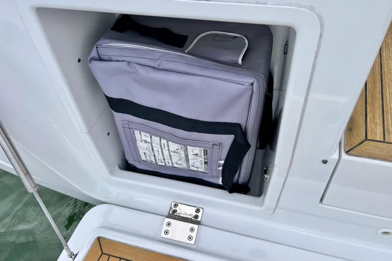 Slide: The Image of Storage compartment on a 2016 Hanse 455 yacht with a neatly packed bag. - 66
