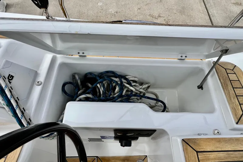 Slide: The Image of Storage compartment with ropes on a 2016 Hanse 455 sailboat deck. - 71