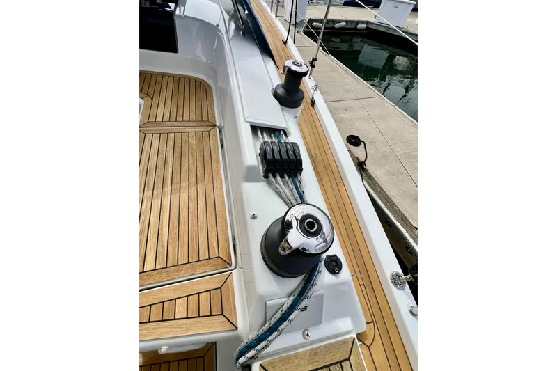 Slide: The Image of Deck of 2016 Hanse 455 yacht with teak flooring and winches. - 72