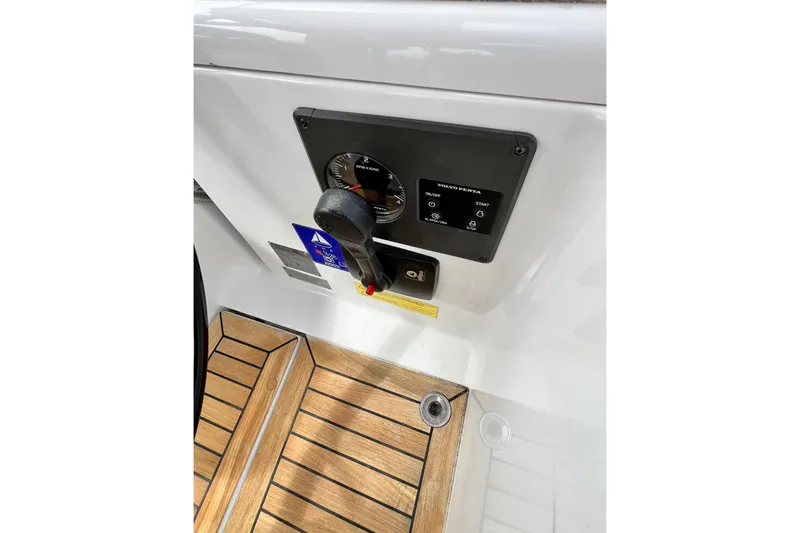 Slide: The Image of Control panel of a 2016 Hanse 455 yacht with wooden flooring. - 74