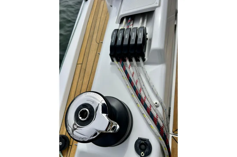 Slide: The Image of Close-up of 2016 Hanse 455 sailboat deck with winch and colorful ropes. - 83