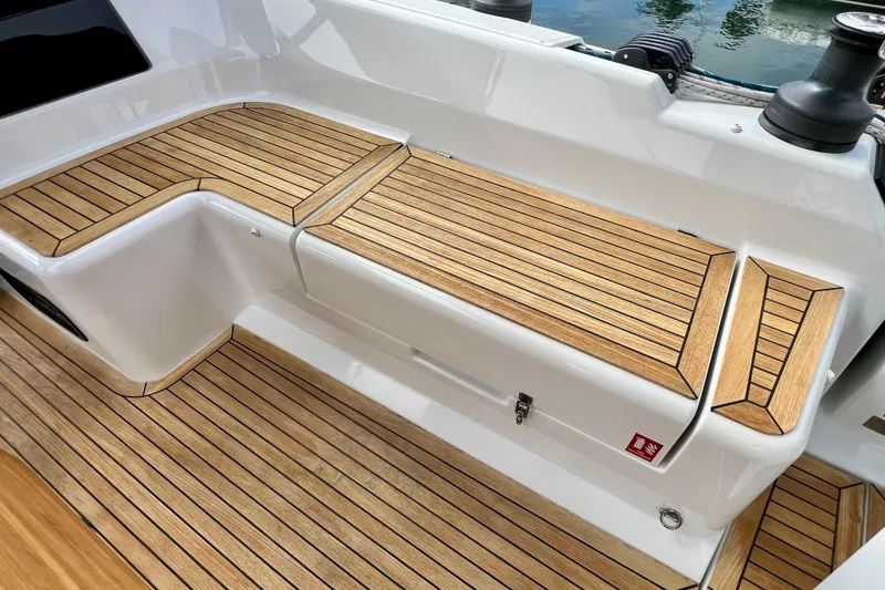 Slide: The Image of Teak deck seating on 2016 Hanse 455 yacht, showcasing elegant design and craftsmanship. - 86