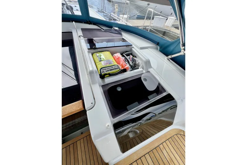 Slide: The Image of Storage compartment on 2016 Hanse 455 yacht with safety equipment and supplies. - 91