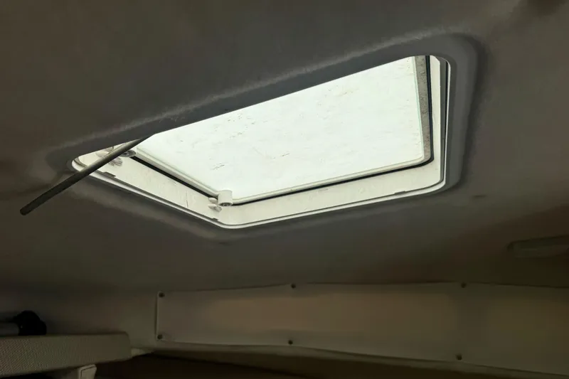 Slide: The Image of Open hatch on 2005 Bayliner 222 Classic boat interior ceiling. - 27