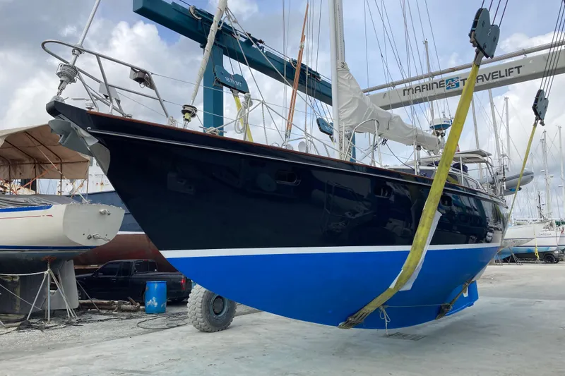 Slide: The Image of Sailboat in dry dock, 1994 Hutting 40', suspended by a travel lift. - 53