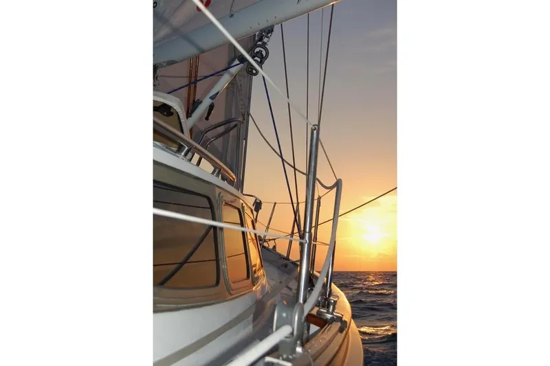 Slide: The Image of Sailing yacht at sunset, 1994 Hutting 40', ocean view. - 59