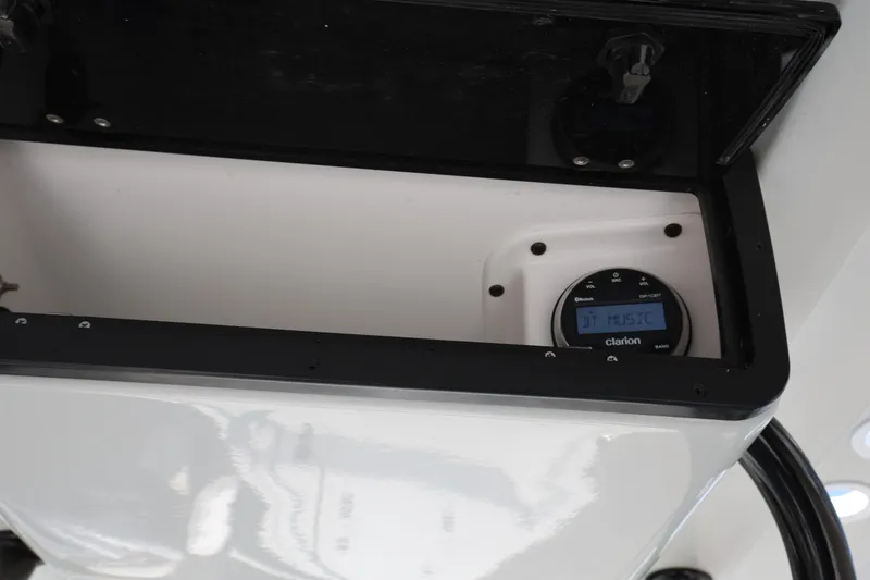 Slide: The Image of 2021 Blazer Bay 2400 boat console with Clarion Bluetooth music system. - 18
