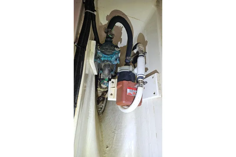 Slide: The Image of Bilge pump system in a 1996 Hunter Legend 40.5 sailboat. - 24