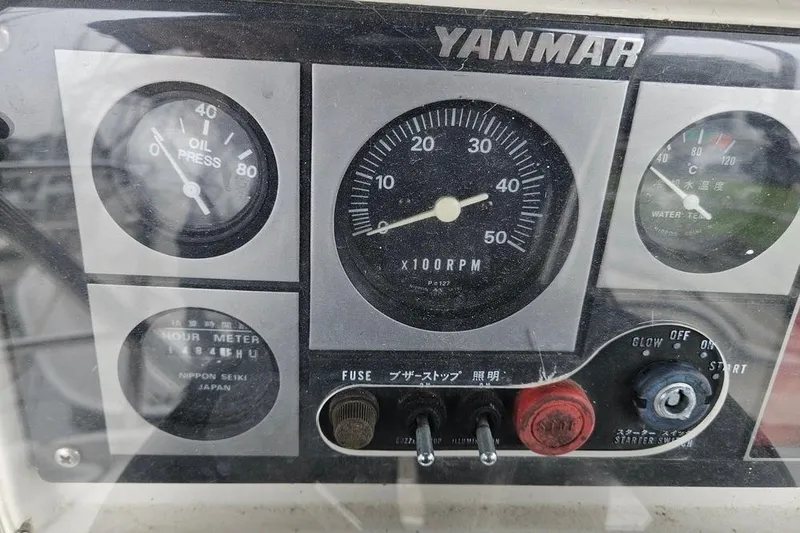 Slide: The Image of Control panel of a 1996 Hunter Legend 40.5 sailboat with Yanmar engine gauges. - 29