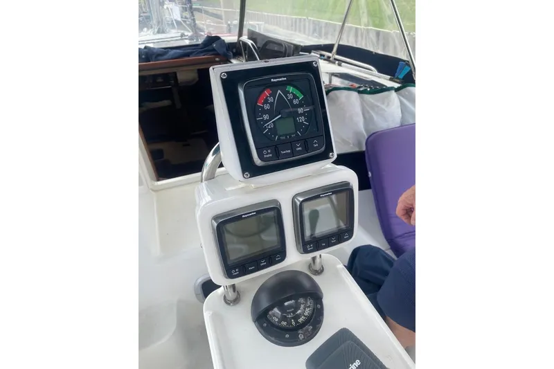 Slide: The Image of Cockpit instruments on a 1996 Hunter Legend 40.5 sailboat. - 27