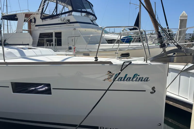 Slide: The Image of 2017 Beneteau Oceanis 38 sailboat named Catalina docked at a marina. - 11
