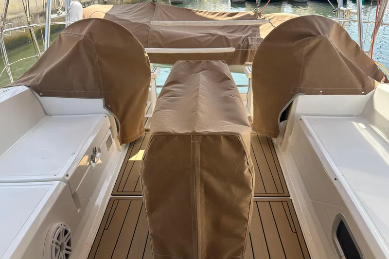 Slide: The Image of Covered deck area of a 2017 Beneteau Oceanis 38 sailboat. - 15
