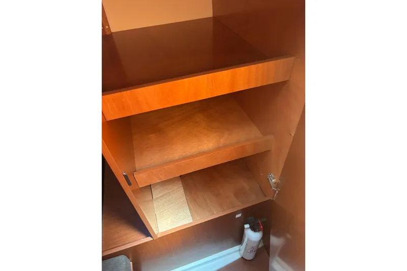 Slide: The Image of Wooden cabinet interior on a 2017 Beneteau Oceanis 38 sailboat. - 20