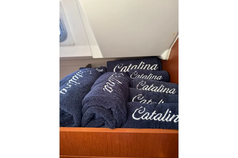 Slide: The Image of Navy towels embroidered with "Catalina" in a Beneteau Oceanis 38 yacht, 2017 model. - 21