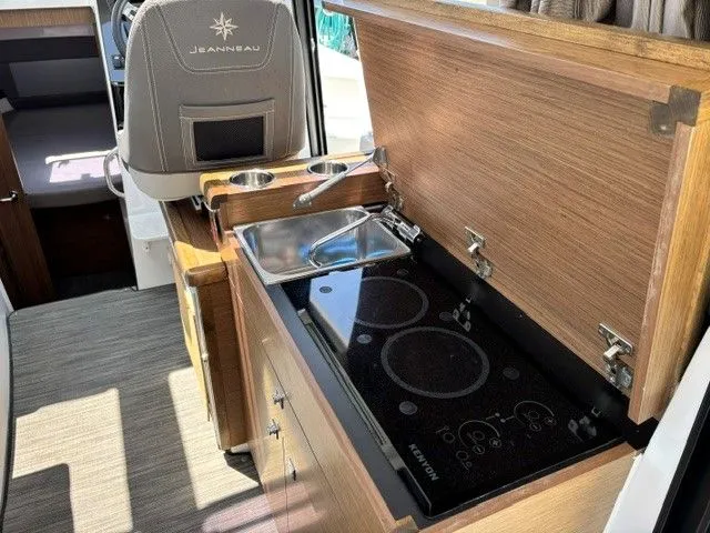 Slide: The Image of Compact kitchen with sink and stove on a boat. - 25