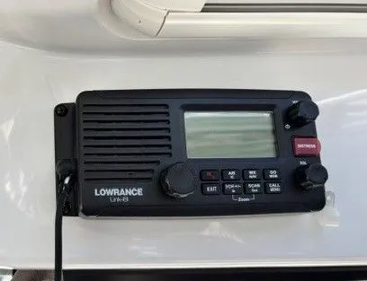 Slide: The Image of A Lowrance VHF radio is mounted on the boat. - 20
