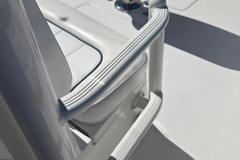 Slide: The Image of Close-up of a 2016 Regulator 41 boat's seating and railing detail. - 15