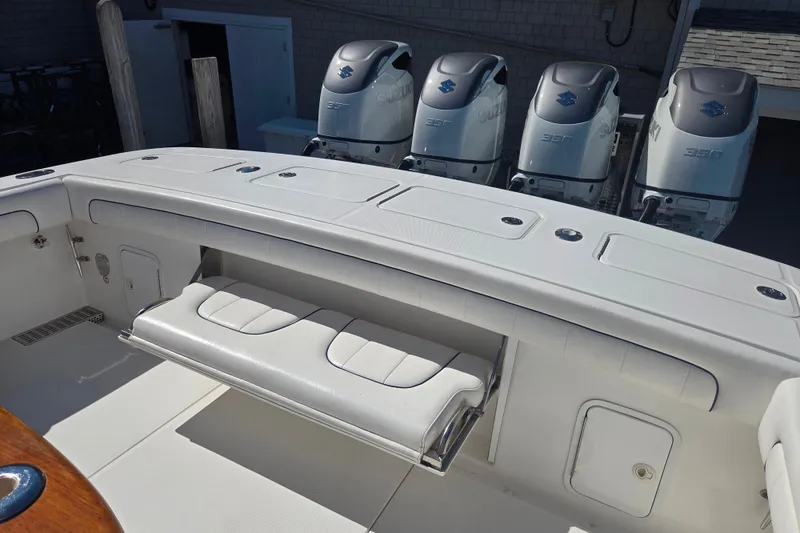 Slide: The Image of 2016 Regulator 41 boat with Suzuki 350 engines and foldable seating. - 19