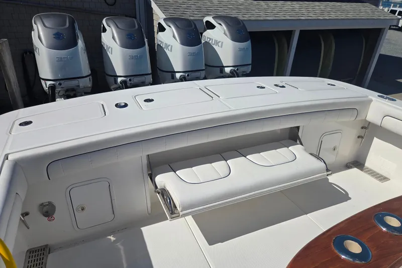 Slide: The Image of 2016 Regulator 41 boat with Suzuki engines and foldable seating. - 26