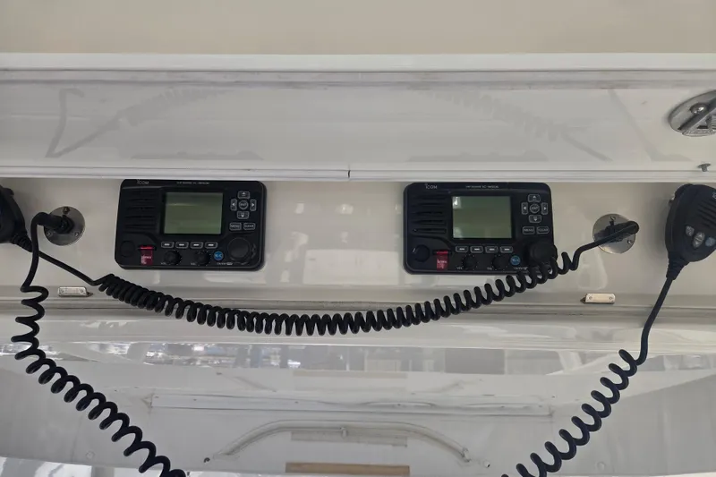 Slide: The Image of 2016 Regulator 41 boat communication system with dual Icom radios and microphones. - 27