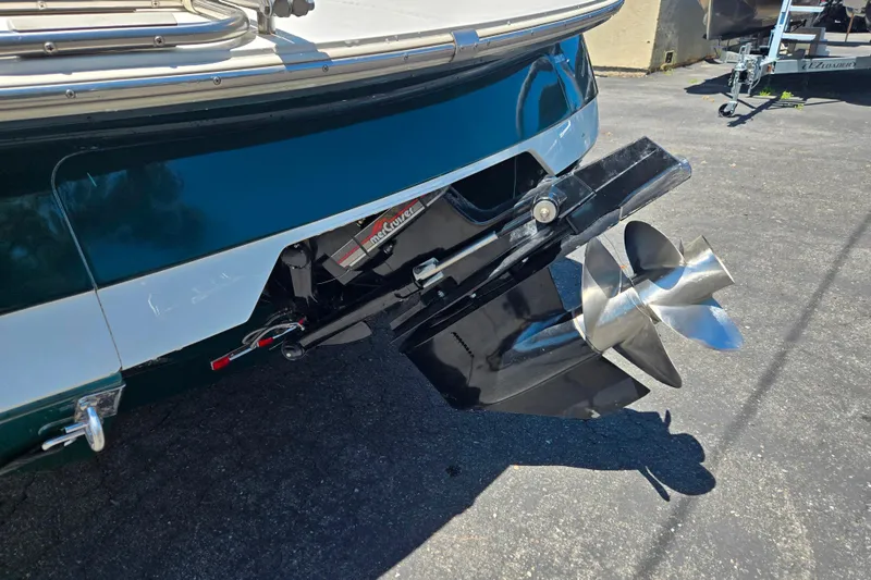 Slide: The Image of 1996 Cobalt 232 boat with MerCruiser outdrive and stainless steel propeller. - 9