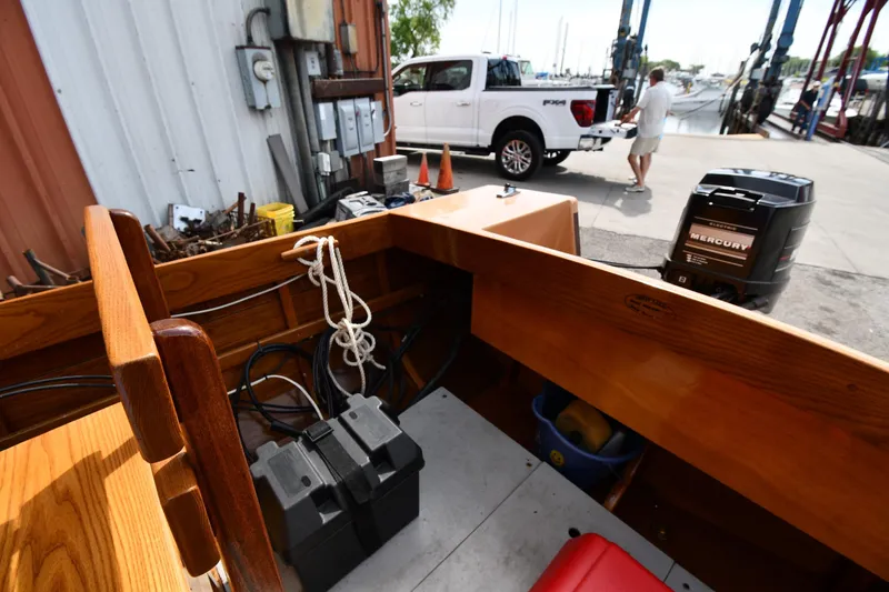 Slide: The Image of Interior of a 2003 Great Lakes 16 Skiff boat with Mercury outboard motor. - 9