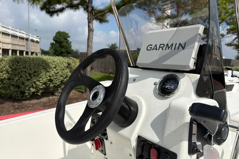 Slide: The Image of Steering console of 2026 Mako Pro Skiff 17 CC with Garmin navigation system. - 5