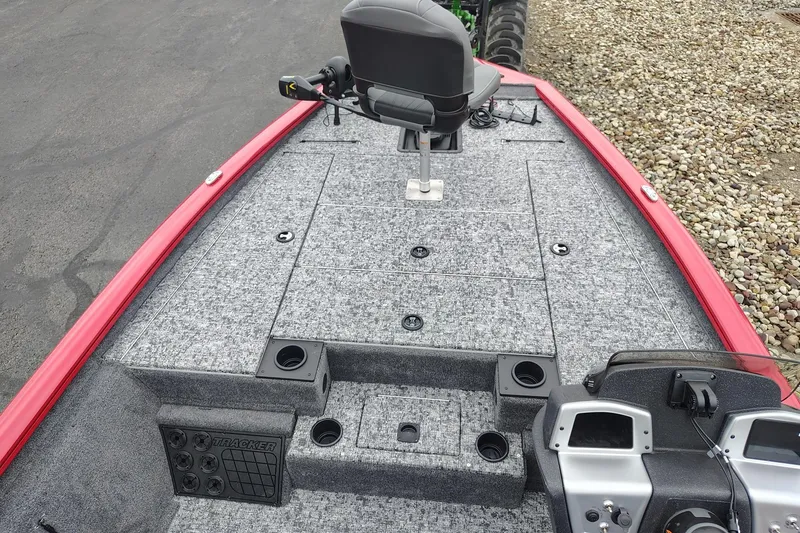 Slide: The Image of 2026 Tracker Pro Team 195 boat deck with seating and storage compartments. - 4