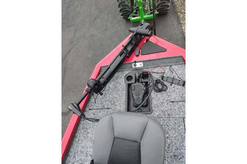 Slide: The Image of 2026 Tracker Pro Team 195 boat interior with trolling motor and control panel. - 5