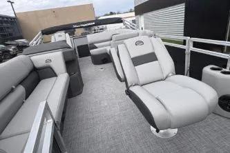 Slide: The Image of 2026 Sun Tracker SportFish 20 DLX pontoon boat with spacious seating and modern design. - 6