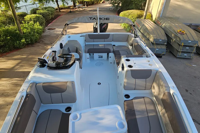 Slide: The Image of 2026 Tahoe 1950 boat interior with spacious seating and modern design. - 10