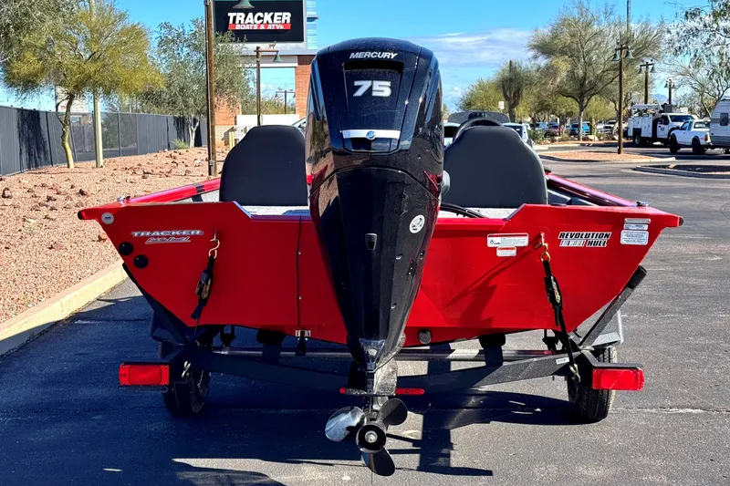 Slide: The Image of 2026 Tracker Pro Team 175 Crappie Edition boat with Mercury 75 engine, parked outdoors. - 3