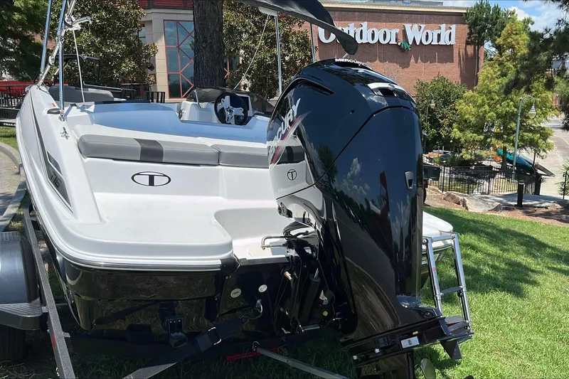 Slide: The Image of 2026 Tahoe T16 boat with Mercury engine at Outdoor World display. - 4