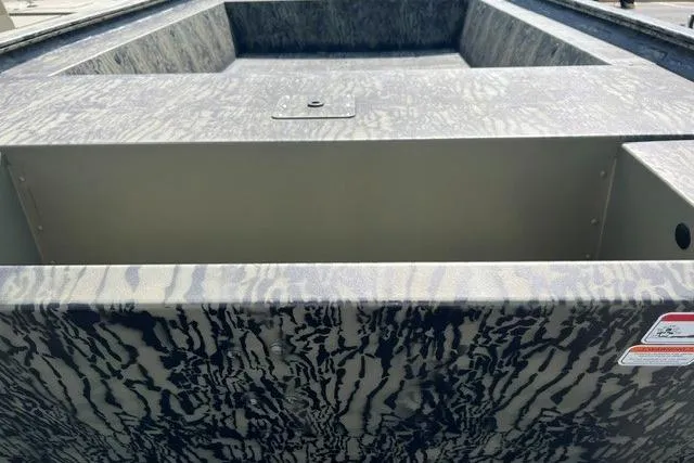 Slide: The Image of 2026 Tracker Grizzly 1754 Utility boat with camouflage pattern, showcasing spacious interior design. - 3