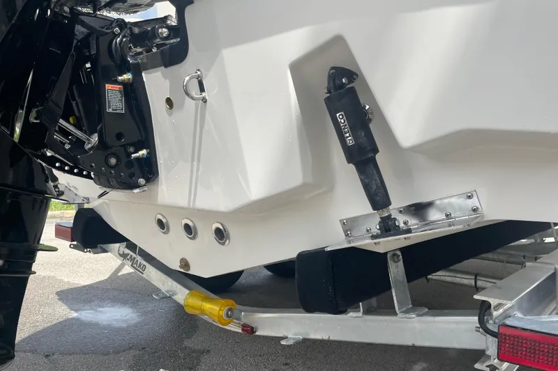 Slide: The Image of 2026 Mako 226 Center Console boat on trailer, showcasing hull and trim details. - 14