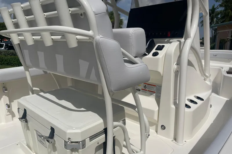Slide: The Image of 2026 Mako 226 Center Console boat interior with seating and storage. - 9