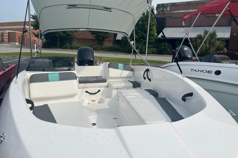 Slide: The Image of 2026 Tahoe T16 boat with canopy, featuring spacious seating and modern design. - 6