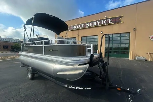 The Image of 2026 Sun Tracker Bass Buggy 16 XL Select pontoon boat at service center. - 0