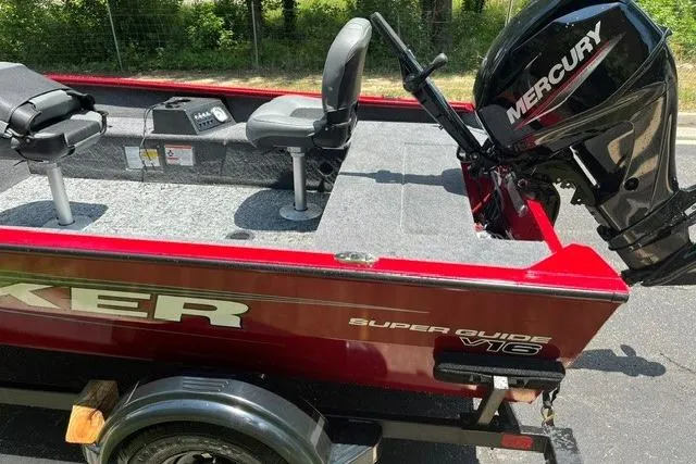 Slide: The Image of 2026 Tracker Super Guide V-16 T boat with Mercury engine on trailer. - 10
