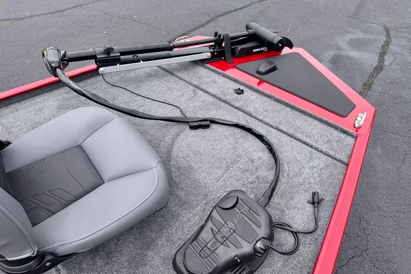 Slide: The Image of 2026 Tracker Bass Tracker Classic XL boat interior with seat and trolling motor. - 11