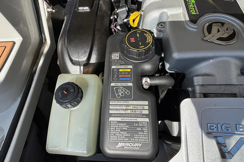 Slide: The Image of Engine compartment of a 2020 Crownline 290 SS boat, featuring Mercury components and specifications. - 17