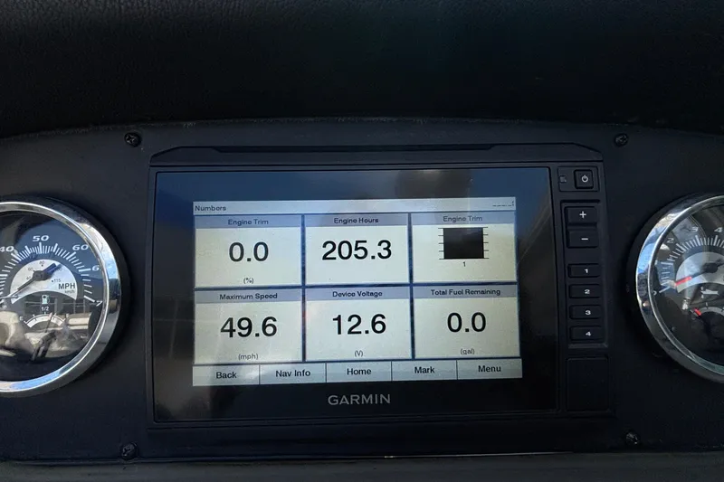 Slide: The Image of Garmin display on 2020 Crownline 290 SS boat showing engine data and speedometer. - 28