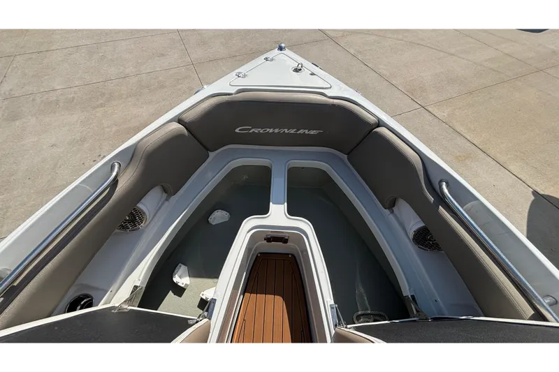 Slide: The Image of 2020 Crownline 290 SS boat interior with cushioned seating and sleek design. - 51