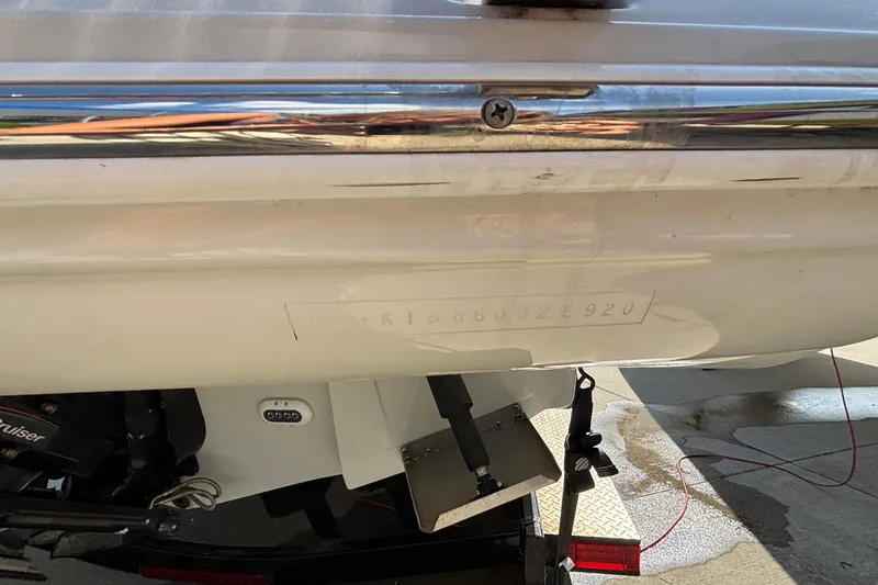 Slide: The Image of 2020 Crownline 290 SS boat stern with visible hull identification number. - 59