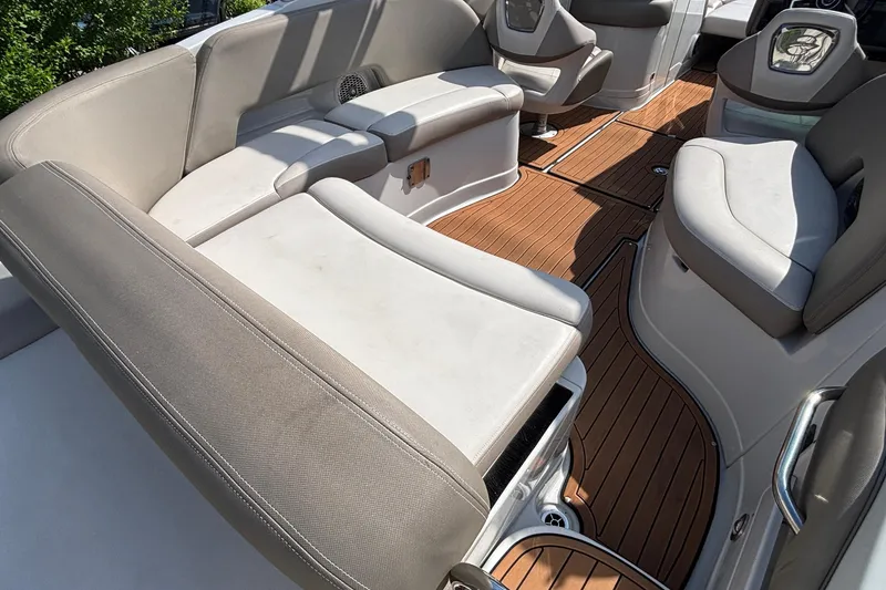 Slide: The Image of Luxurious interior of 2020 Crownline 290 SS boat with plush seating and teak flooring. - 9