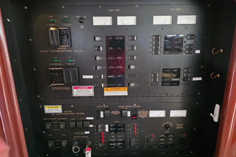 Slide: The Image of Electrical distribution panel on a 2002 Sea Ray 560 Sedan Bridge yacht. - 100