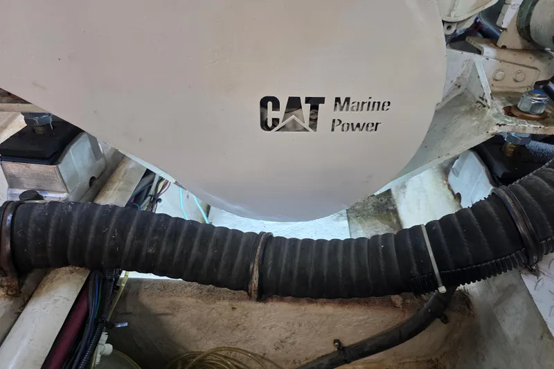 Slide: The Image of Engine compartment of 2002 Sea Ray 560 Sedan Bridge with CAT Marine Power. - 147