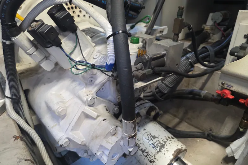 Slide: The Image of Engine compartment of a 2002 Sea Ray 560 Sedan Bridge with visible wiring and components. - 156